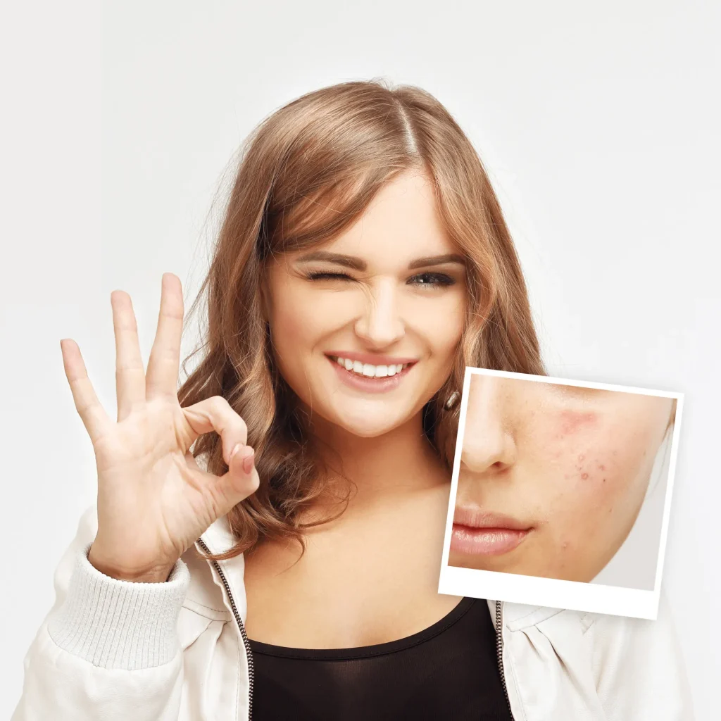Woman smiling while holding skincare product