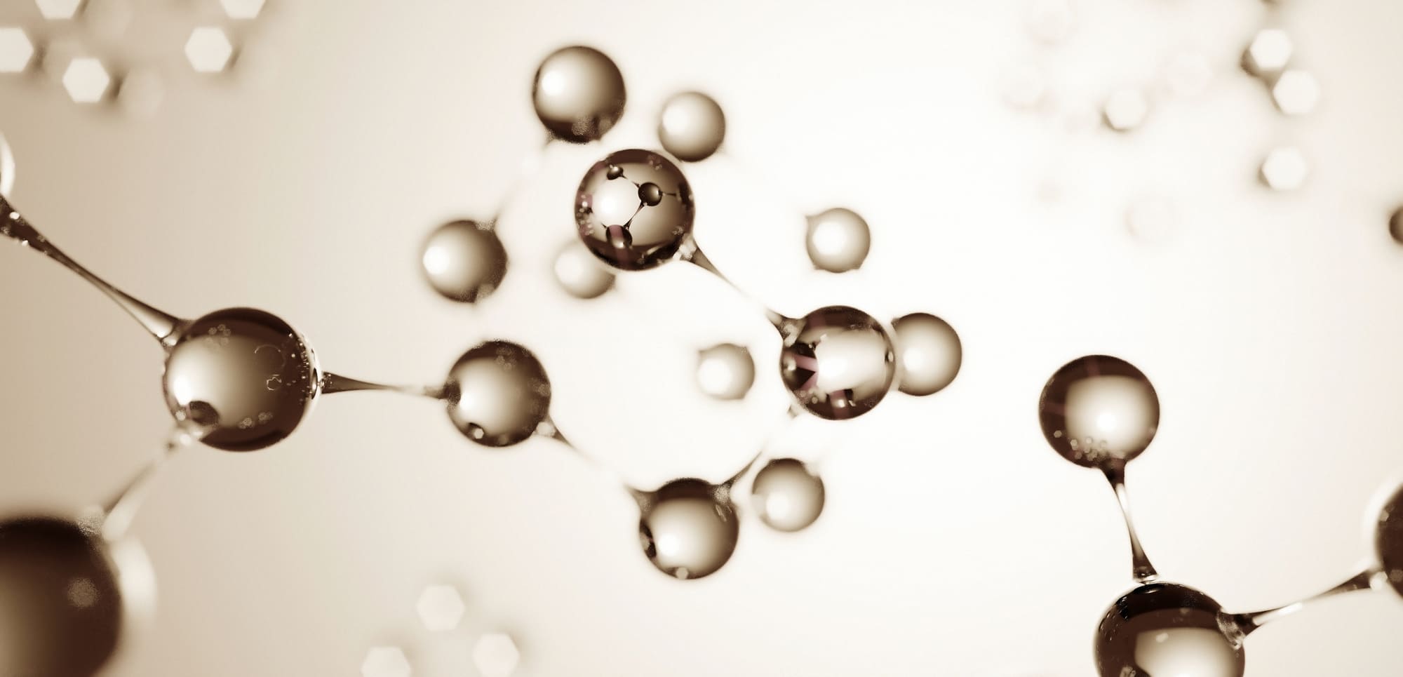 Artistic representation of molecules with connected spherical structures on a beige background.